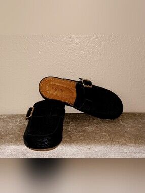 Flex Step Black Slip-On Clogs with Goldtone Adjustable Buckle.
